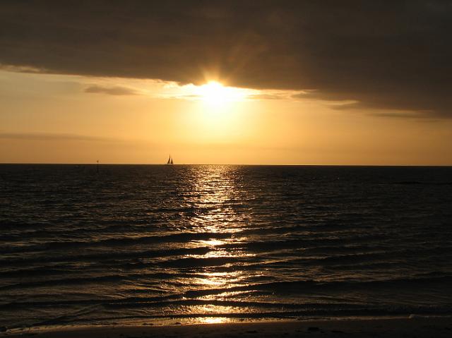 IMG_7404 Sunset and sailboat on the water