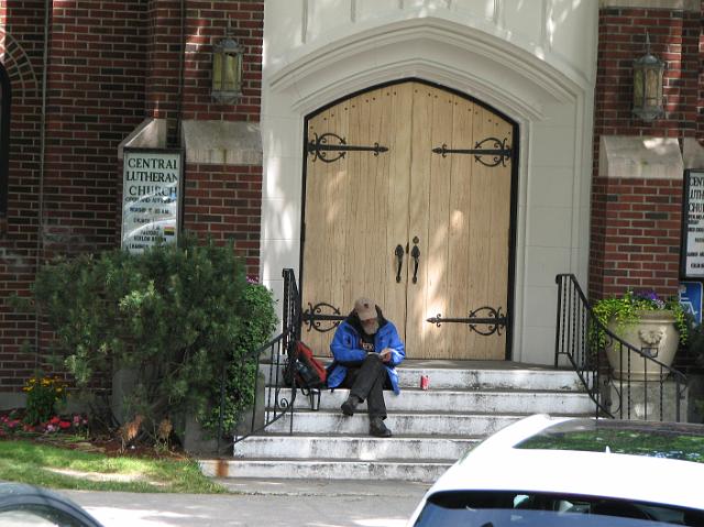 IMG_2653 Man reading on church steps