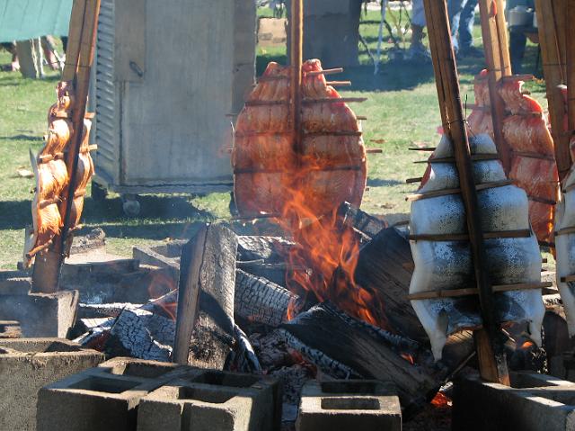 IMG_3934 Salmon being cooked by an open flame