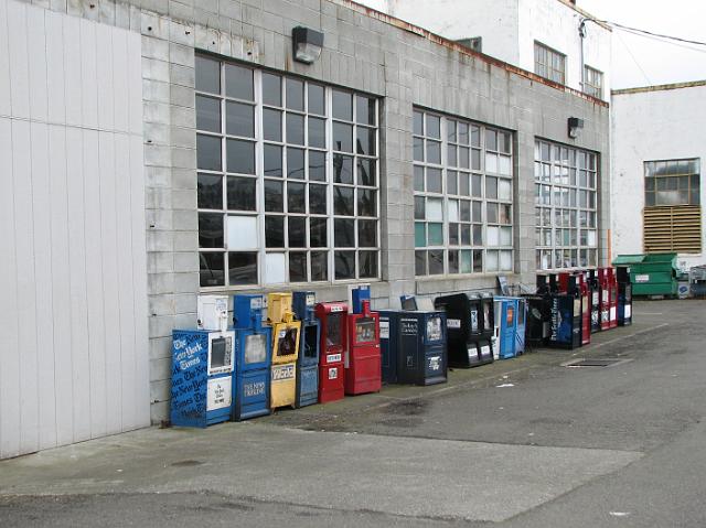 IMG_5380 Newspaper machines stored beside the building