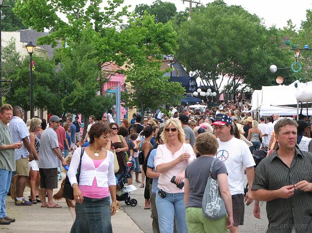 IMG_2330 After spending time with my brother in Norman, Lesley and I went to Oklahoma City. We went to an outdoor arts festival that happened to be going on. There were a lot of artists with their art on display, and a lot of people.