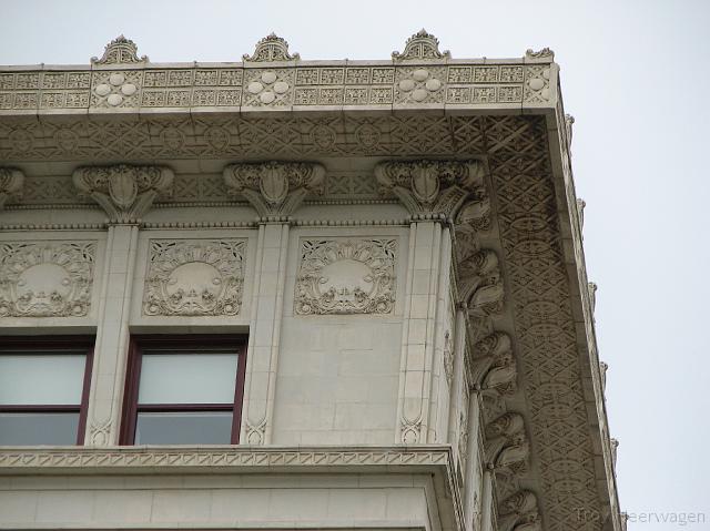 IMG_2452 Decorative top level of a downtown building.